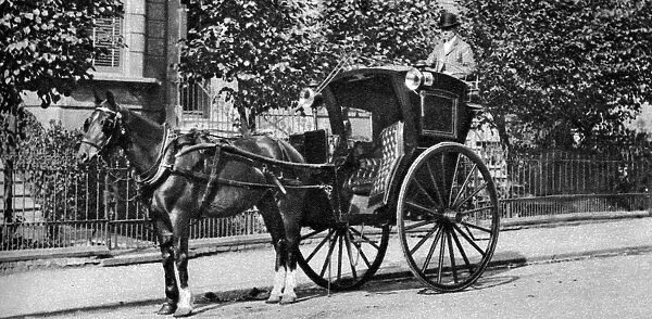 A horse-drawn hansom cab, London, 1926-1927