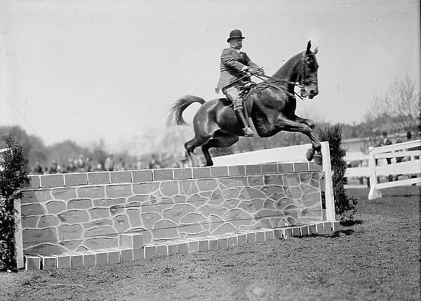 Horse Shows - Col. A.W. Dunn, Hurdling, 1911. Creator: Harris & Ewing. Horse Shows - Col. A.W. Dunn, Hurdling, 1911. Creator: Harris & Ewing