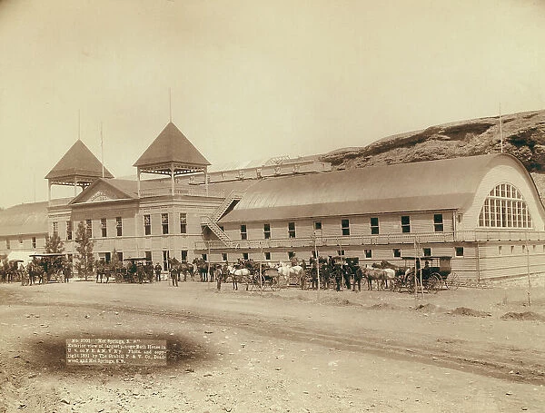 Hot Springs, SD Exterior view of largest plunge bath house in US on FE and MV R'y, 1891. Creator: John C. H. Grabill
