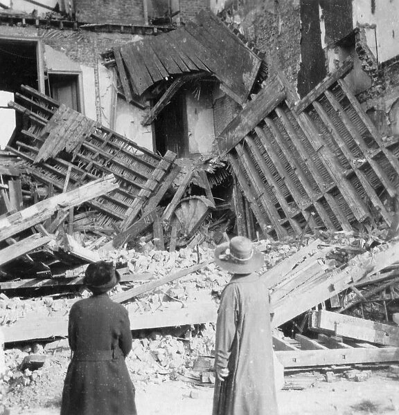 House destroyed by a bomb, Armentieres, France, World War I, c1914-c1918. Artist: Nightingale & Co