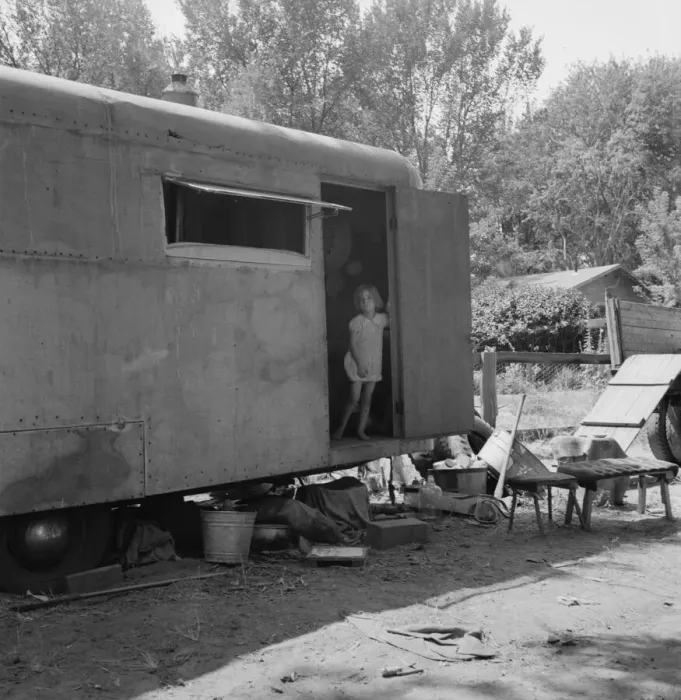 Framed Print : The house trailer and the youngest little girl, Washington, Yakima Valley, Toppenish, 1939. Creator: Dorothea Lange Framed Print : The house trailer and the youngest little girl, Washington, Yakima Valley, Toppenish, 1939. Creator: Dorothea Lange