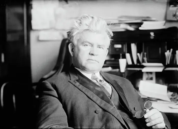 Framed Print : H.T. Rainey, holding bifocals, at desk, 1911. Creator: Bain News Service Framed Print : H.T. Rainey, holding bifocals, at desk, 1911. Creator: Bain News Service