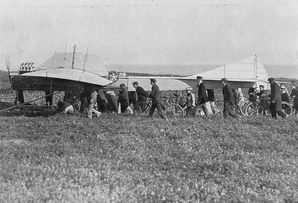 Hubert Latham prepares to take off after Louis Bleriot, near Calais, France, 25 July 1909