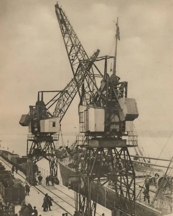 Framed Print : Huge Mobile Cranes at Tilbury Swing the Cargo from a Vessels Hold, c1935. Creator: Unknown Framed Print : Huge Mobile Cranes at Tilbury Swing the Cargo from a Vessels Hold, c1935. Creator: Unknown