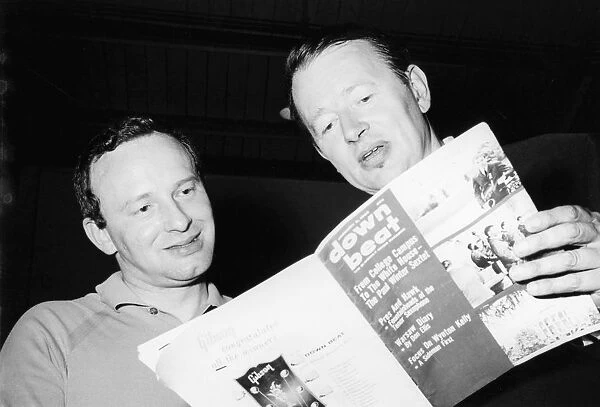Humphrey Lyttleton and Alex Welsh reading a copy of Down Beat magazine, 1963. Creator
