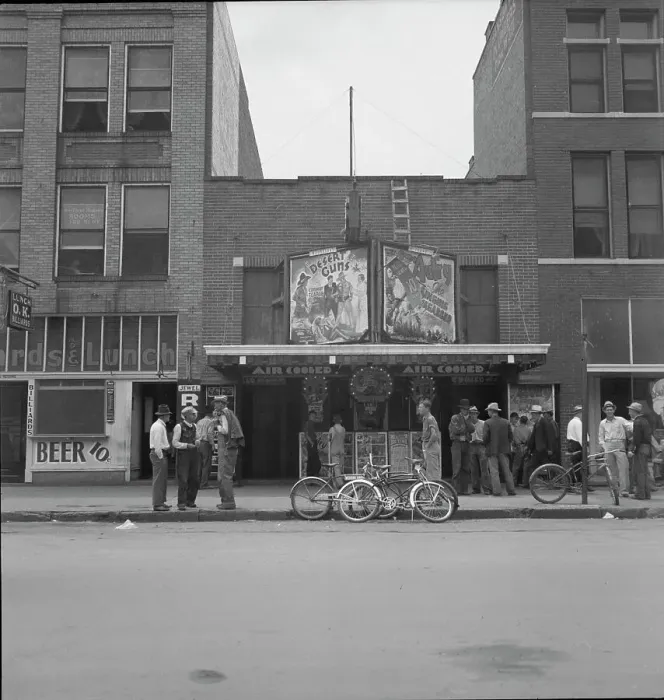 Framed Print : Idle men attend the morning movies, Oklahoma City, Oklahoma, 1937. Creator: Dorothea Lange