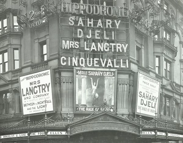 Illuminated advertisements on the front of The Hippodrome, Charing Cross Road, London, 1911