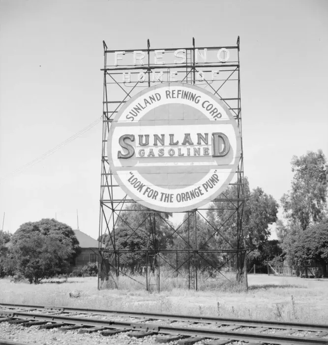 Framed Print : Illuminated sign, approaching San Joaquin Valley town, outskirts of Fresno, on U. S. 99, CA, 1939. Creator: Dorothea Lange Framed Print : Illuminated sign, approaching San Joaquin Valley town, outskirts of Fresno, on U. S. 99, CA, 1939. Creator: Dorothea Lange