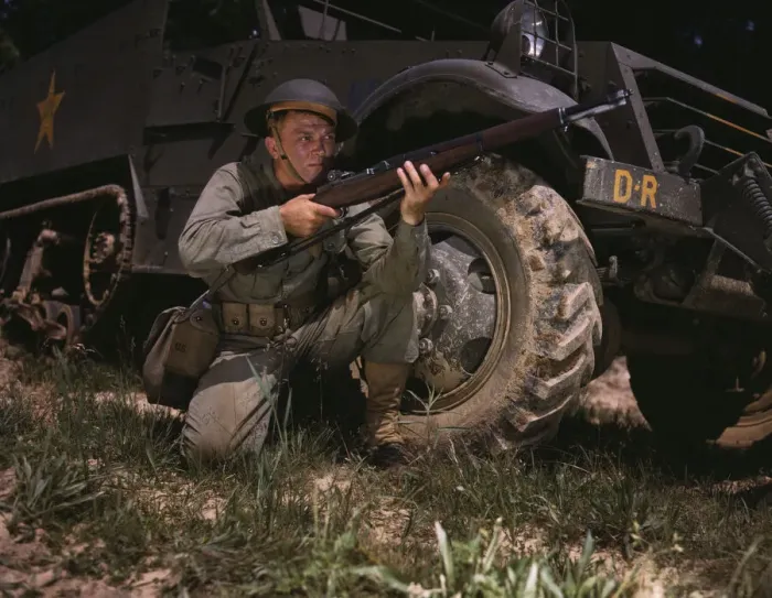 Framed Print : Infantryman with halftrack, a young soldier of the armed forces, holds... Fort Knox, Ky. 1942. Creator: Alfred T Palmer