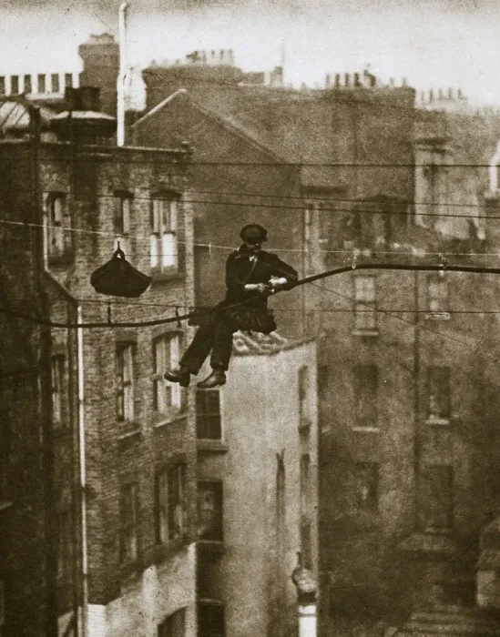Framed Print : Inspecting a telephone cable between Conduit and Maddox Streets, 20th century. Artist Framed Print : Inspecting a telephone cable between Conduit and Maddox Streets, 20th century. Artist