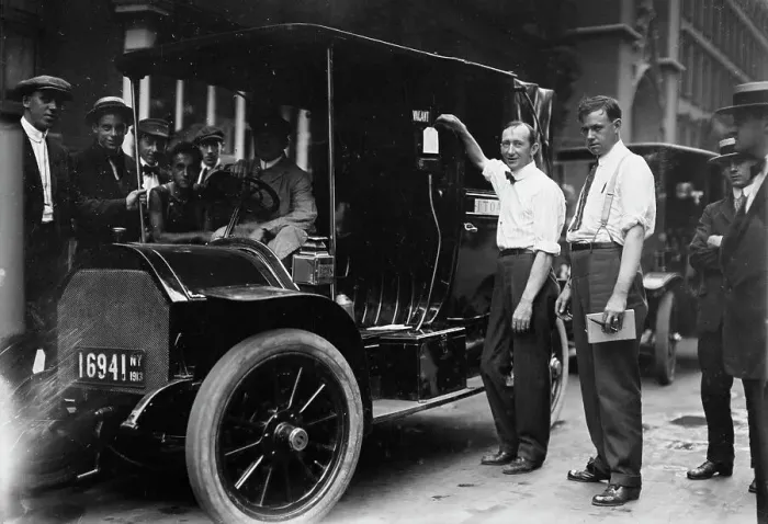 Framed Print : Inspector Walsh condemning taxicab, 1913. Creator: Bain News Service Framed Print : Inspector Walsh condemning taxicab, 1913. Creator: Bain News Service