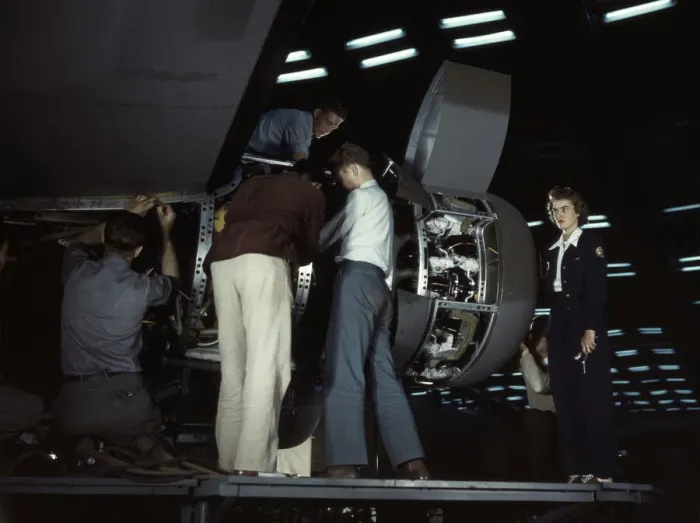Framed Print : Installing an engine at the Consolidated Aircraft Corporation plant, Fort Worth, Texas, 1942. Creator: Howard Hollem Framed Print : Installing an engine at the Consolidated Aircraft Corporation plant, Fort Worth, Texas, 1942. Creator: Howard Hollem