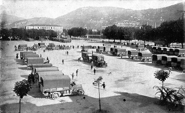 Inter-allied Support; Assembling, on the Place d'Armes in Nice, automobile trucks... 1917. Creator: Pelanda