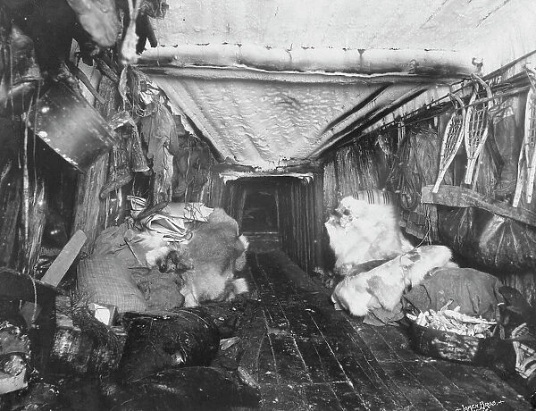Interior of Eskimo hut, 1916. Creator: Lomen Brothers