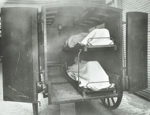 Interior of a horse drawn Metropolitan Asylums Board ambulance, London, 1939
