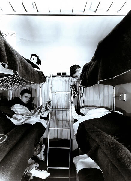 Interior of a traveler car wagon with bunks, 1950