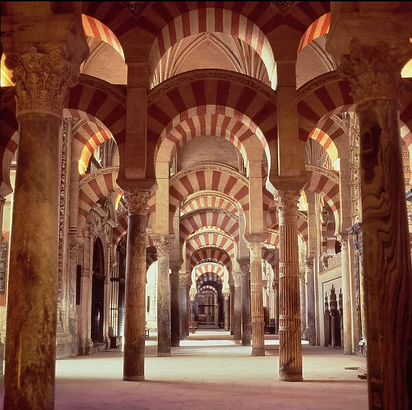 Interior view with columns of marble, jasper and granite in the Mosque of Cordoba