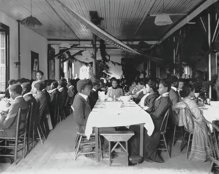 Framed Print : Interior view of dining hall, decorated for the holidays, with students... Tuskegee Institute, c1902 Creator: Frances Benjamin Johnston Framed Print : Interior view of dining hall, decorated for the holidays, with students... Tuskegee Institute, c1902 Creator: Frances Benjamin Johnston