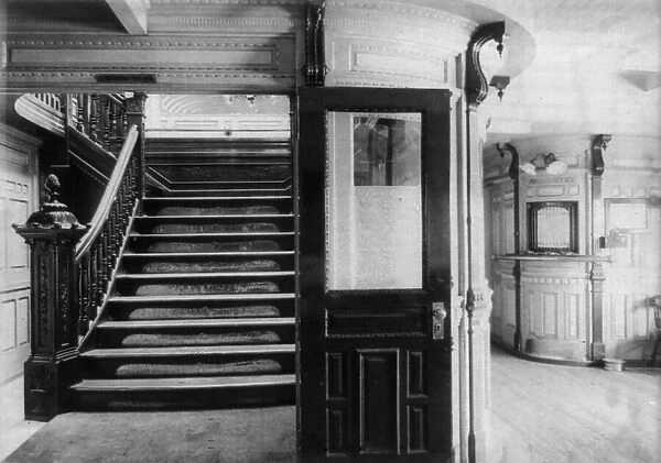Interior view of steamboat showing stairway and pursers office, c1900. Creator: Frances Benjamin Johnston