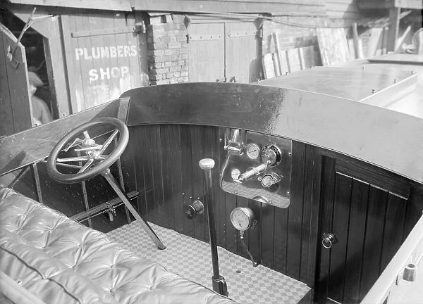 The Interior of a Wolseley launch showing controls and instrument panel. Creator