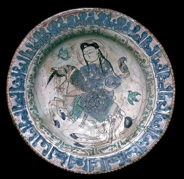 Iranian plate showing a horseman with a falcon, 13th century