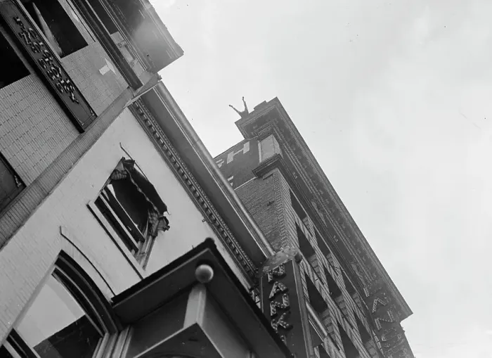 Framed Print : J. Reynolds, Performing Acrobatic And Balancing Acts On High Cornice Above 9th Street, N.W. 1917. Creator: Harris & Ewing. J. Reynolds, Performing Acrobatic And Balancing Acts On High Cornice Above 9th Street, N.W. 1917 Framed Print : J. Reynolds, Performing Acrobatic And Balancing Acts On High Cornice Above 9th Street, N.W. 1917. Creator: Harris & Ewing. J. Reynolds, Performing Acrobatic And Balancing Acts On High Cornice Above 9th Street, N.W. 1917