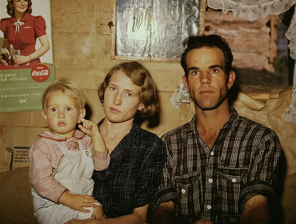 Jack Whinery, homesteader, with his wife and the youngest of his five... Pie Town, New Mexico, 1940 Creator: Russell Lee