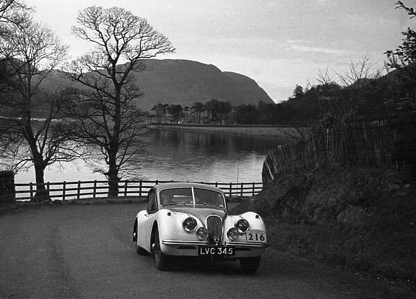 Jaguar XK120, Stirling Moss, 1952 Daily Express Rally. Creator: Unknown