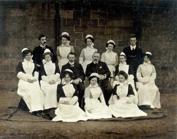 Framed Print : James Rutherford Morison with his staff: three men and ten women, c1900. Creator: Unknown Framed Print : James Rutherford Morison with his staff: three men and ten women, c1900. Creator: Unknown