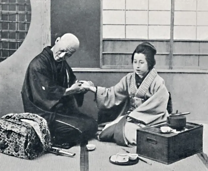 Framed Print : A Japanese doctor and patient, 1902. Artist: Kajima & Suwo Framed Print : A Japanese doctor and patient, 1902. Artist: Kajima & Suwo