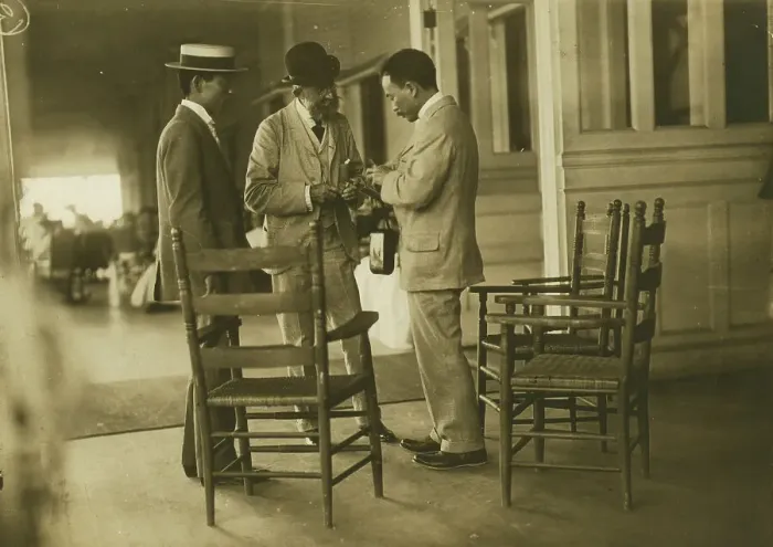 Framed Print : Two Japanese men and one American(?) man, probably journalists, conversing on the veranda... 1905. Creator: Unknown Framed Print : Two Japanese men and one American(?) man, probably journalists, conversing on the veranda... 1905. Creator: Unknown