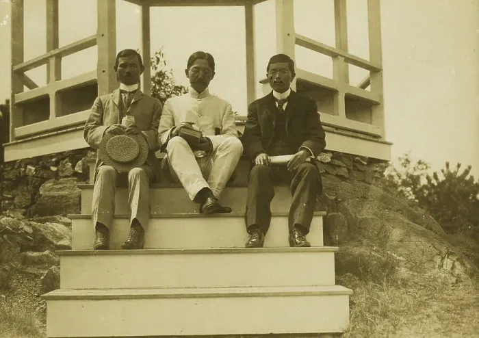 Framed Print : Three Japanese men, possibly journalists, seated on the steps of a gazebo, 1905. Creator: Unknown Framed Print : Three Japanese men, possibly journalists, seated on the steps of a gazebo, 1905. Creator: Unknown