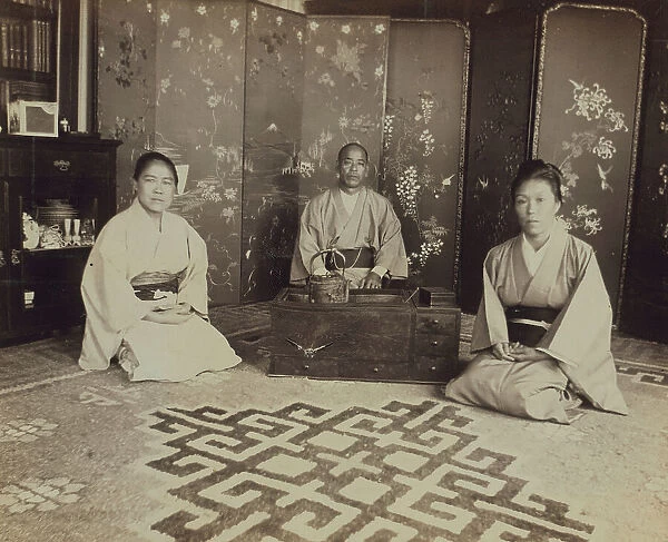 Japanese servants O Hero San, O Eun San, and O Sok San with tea utensils in the... 1899. Creator: Eleanor Lord Pray