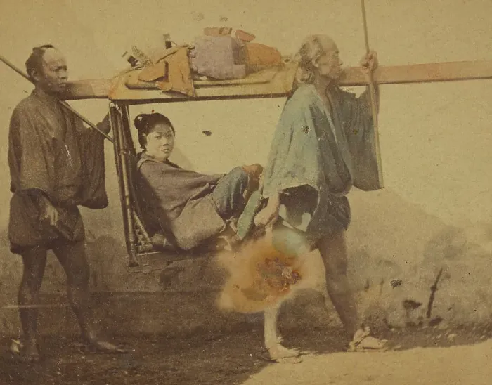 Framed Print : Japanese woman in a sedan, being carried by two men, 1865-1875. Creator: Unknown Framed Print : Japanese woman in a sedan, being carried by two men, 1865-1875. Creator: Unknown