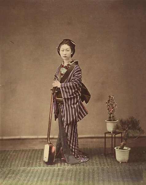 [Japanese Woman in Traditional Dress Posing with Instrument], 1870s. Creator: Unknown