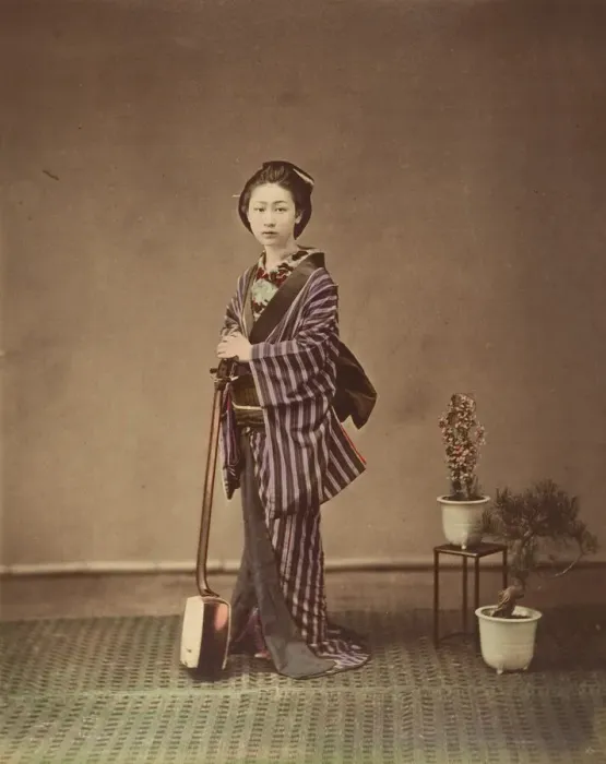 Framed Print : [Japanese Woman in Traditional Dress Posing with Instrument], 1870s. Creator: Unknown