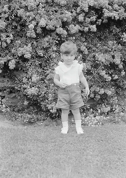 Javits, Benjamin, child of, standing outdoors, 1933 July. Creator: Arnold Genthe
