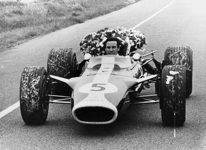 Framed Print : Jim Clark in a Lotus with the winner's laurel wreath Framed Print : Jim Clark in a Lotus with the winner's laurel wreath