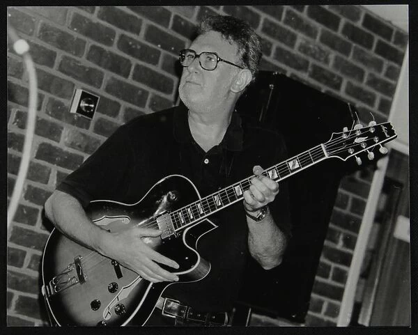 Jim Mullen playing guitar at The Fairway, Welwyn Garden City, Hertfordshire, 3 August 1997