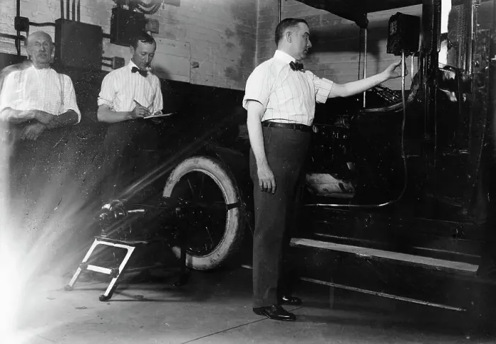 Framed Print : John Drennen inspecting meter, 1913. Creator: Bain News Service Framed Print : John Drennen inspecting meter, 1913. Creator: Bain News Service