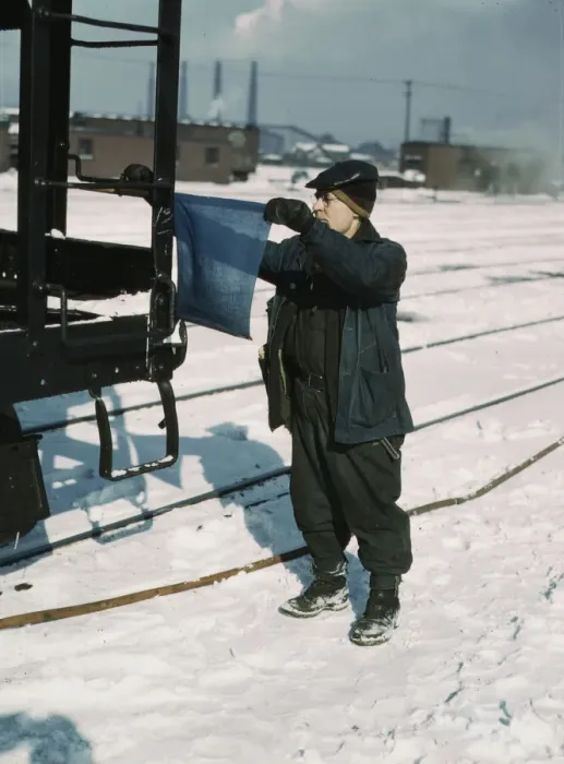 Framed Print : John Paulinski, car inspector, blue flagging a train for inspection, Corwith yard, Chicago, 1943. Creator: Jack Delano Framed Print : John Paulinski, car inspector, blue flagging a train for inspection, Corwith yard, Chicago, 1943. Creator: Jack Delano