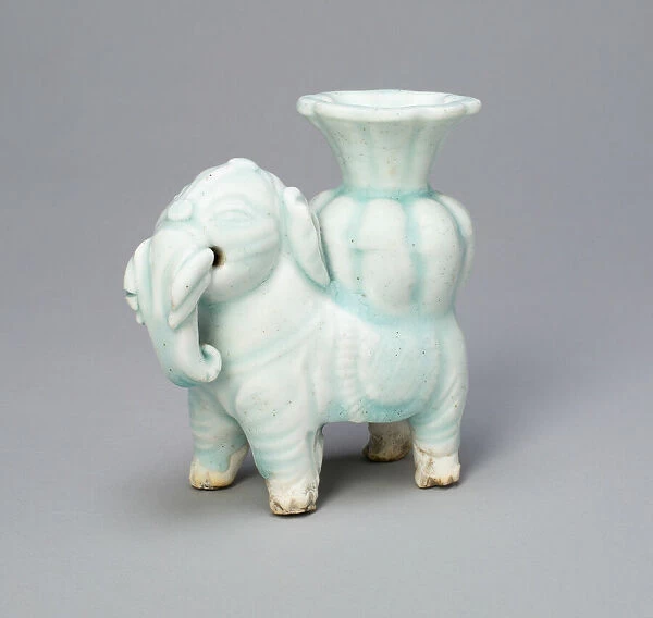 Joss-Stick Holder in the Form of an Elephant Holding a Lobed Vase, Yuan dynasty (1271-1368). Creator: Unknown