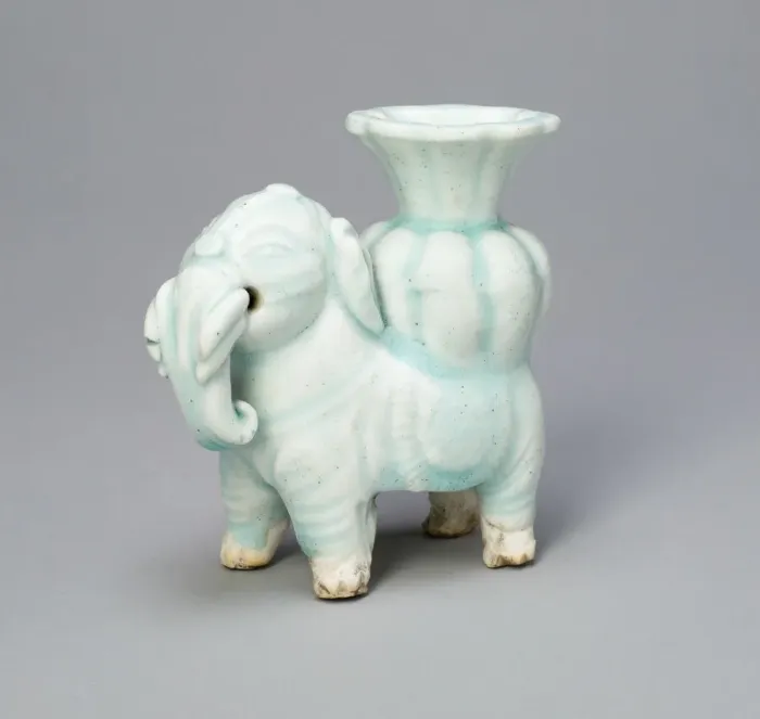 Framed Print : Joss-Stick Holder in the Form of an Elephant Holding a Lobed Vase, Yuan dynasty (1271-1368). Creator: Unknown Framed Print : Joss-Stick Holder in the Form of an Elephant Holding a Lobed Vase, Yuan dynasty (1271-1368). Creator: Unknown