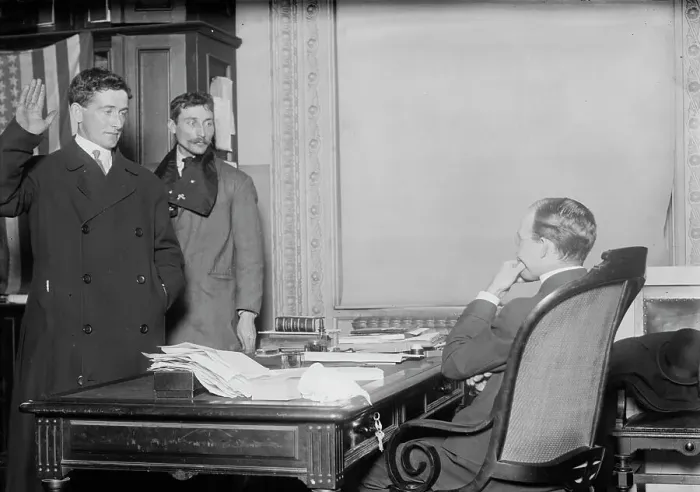 Framed Print : Judge in chambers swearing in a new citizen, New York, 1910. Creator: Bain News Service Framed Print : Judge in chambers swearing in a new citizen, New York, 1910. Creator: Bain News Service