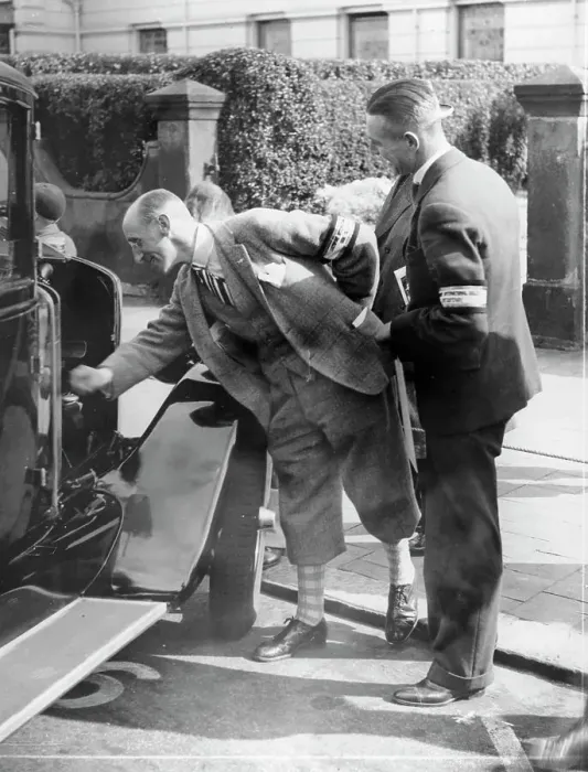 Framed Print : A judge inspecting a car at the Southport Rally, 1928 Framed Print : A judge inspecting a car at the Southport Rally, 1928