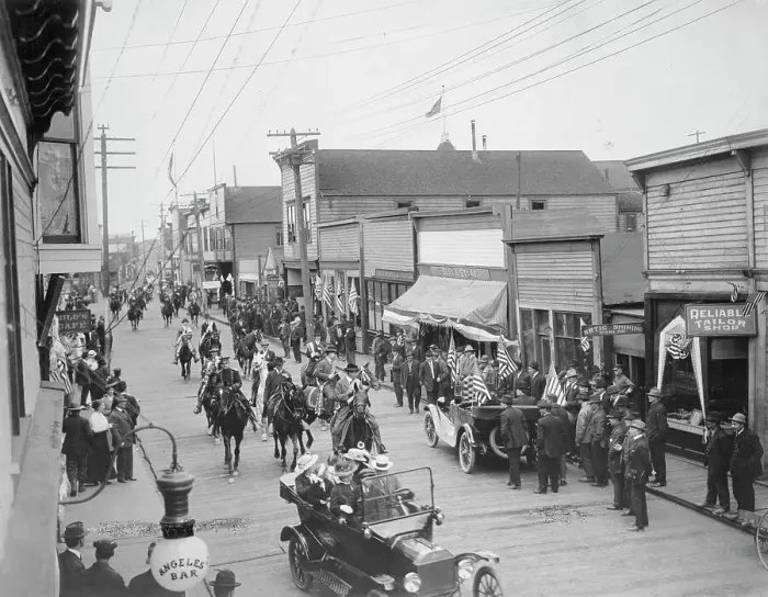 Framed Print : July 4th parade on Front Street, 1916. Creator: Unknown Framed Print : July 4th parade on Front Street, 1916. Creator: Unknown