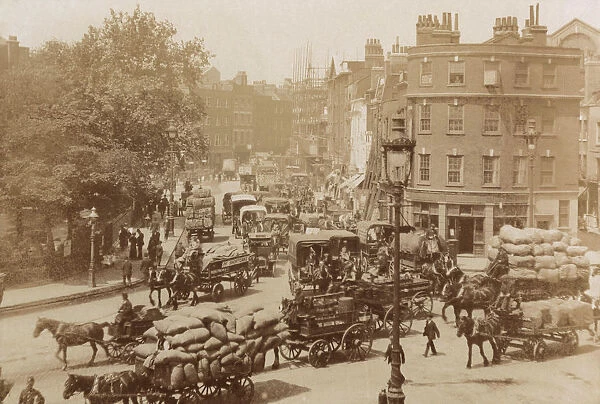 Junction of Tower Hill, Mansell Street and Tower Bridge, London, 11 June 1914. Artist