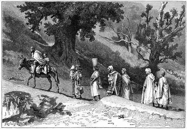 Kabyle family group travelling, Algeria, c1890. Artist: Hildibrand
