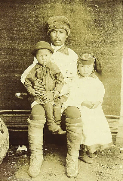 A Kachin Individual (over 30 Years Old). Tanzybaev with Children. Village of Ust'-Abakan, 1894. Creator: Unknown