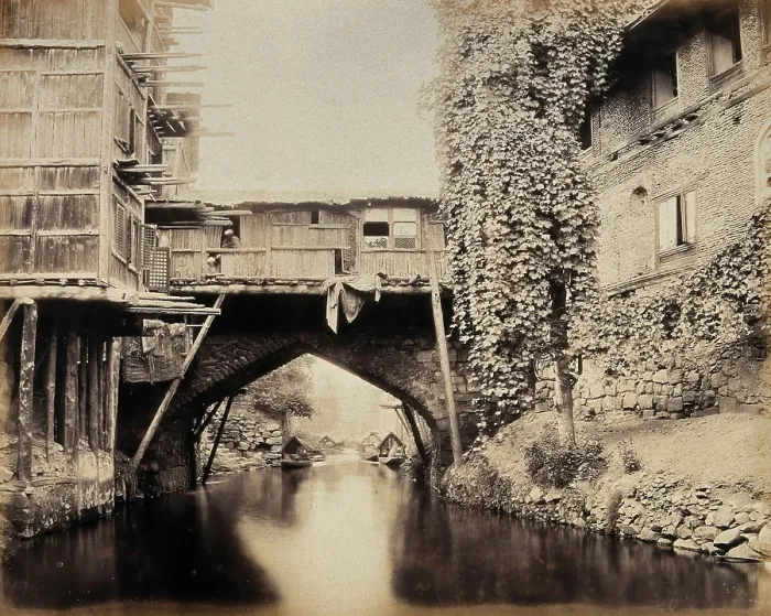 Framed Print : Kashmir: a built-over bridge on a canal betweeen houses, c1870s. Creator: Samuel Bourne Framed Print : Kashmir: a built-over bridge on a canal betweeen houses, c1870s. Creator: Samuel Bourne